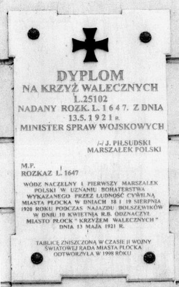22 Tablica na ścianie płockiego ratusza,