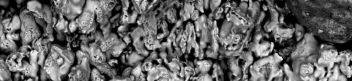 Spiekane tuleje proszkowe samosmarnego łoŝyska ślizgowego... 59 66,44 µm 58,26 µm 77,52µm 85,09 µm 52,16 µm 71,11 µm 62,94 µm 64,41 µm Rys. 5. Warstwa wierzchnia tulei modyfikowanej cząstkami MoS 2 Fig.