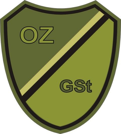 W górnej części tarczy, po lewej stronie wpisane są litery OZ, natomiast w dolnej części tarczy, po prawej stronie litery GSt.
