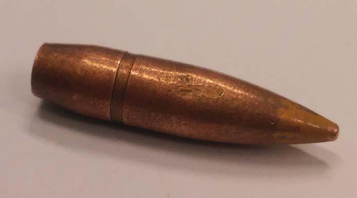 Michał STOPEL, Dariusz SKIBICKI, Jakub RUSZKOWSKI Rys. 3. Geometria pocisku kalibru 7,92 33 oraz obiekt rzeczywisty Fig. 3. Geometry of bullet cal.