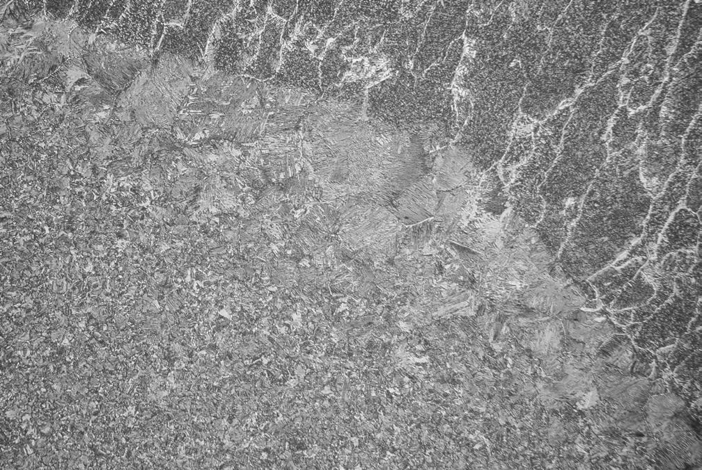 specimen 1-O. Magn. 400 Rys. 9. Struktura spoiny. Pow.