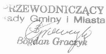 Uzasadnienie W budzecie grniny i miasta na 2004 rok dokonano zmian po stronie dochodow i wydatkow o kwotq netto 26.771 zl. sq otrzymane Srodku ze Sapardu na drogq Dlugie ~mielnik w wysokoici minus 17.