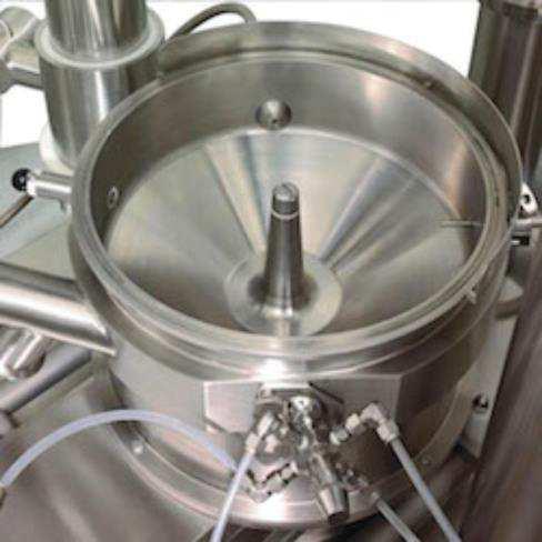 Wstęp Komora z natryskiem stycznym Flo-Coater (Freund-Vector Corporation, Marion, Iowa, USA) posiada wklęsły rotor Granurex (Rycina 18) i przeznaczona jest do peletyzacji oraz powlekania [32].