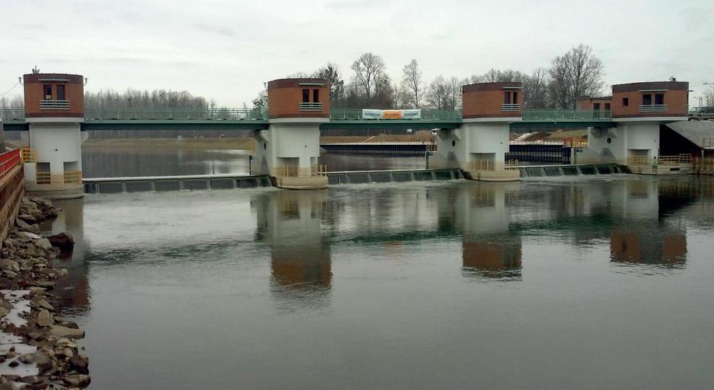 Nowoczesne układy hydrauliczne Bosch Rexroth na obiektach hydrotechnicznych na przykładzie jazu w Lewinie Brzeskim PI 070051 Widok jazu w Lewinie Brzeskim Bosch Rexroth od wielu lat jest zaliczany do