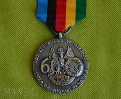 Medal pamiątkowy 60 lat w misjach pokojowych 209-0-7 Medal pamiątkowy
