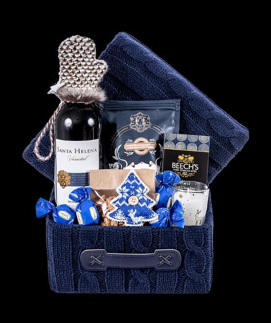 Kuferek Blue Merlot Kartonowe pudełko pokryte wełnianą tkaniną, kryjące: Chilijskie, czerwone wino Santa Helena Merlot, Tabliczkę czekolady deserowej z nadzieniem miętowym, Hiszpańskie karmelki