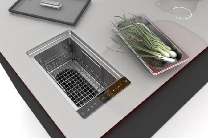 W blacie znajduje się zintegrowane urządzenie do gotowania na parze i sous-vide, czyli w próżni.