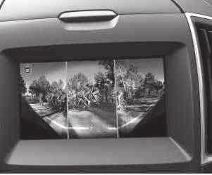 Blind Spot Information z Cross Traffic Alert Ø Gdy inny pojazd wjedzie w Twoją strefę martwego pola, system ostrzeże Cię za pomocą lampek wbudowanych w lusterka boczne po stronie kierowcy i pasażera.