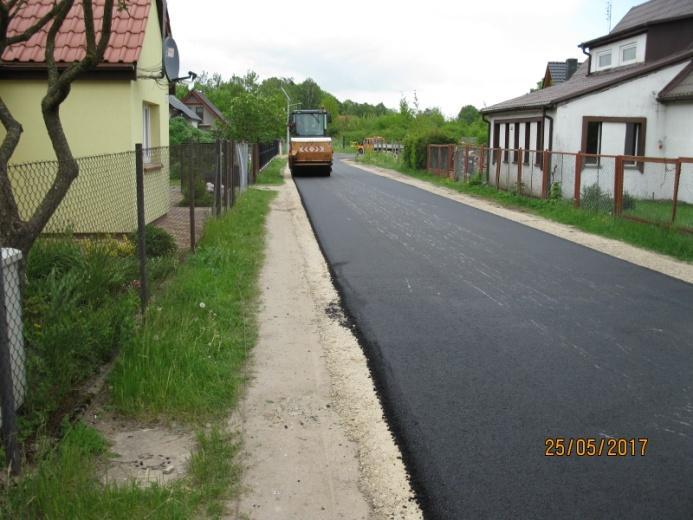 wiążącej z BA AC 11W śr. grub. 4 cm wraz transportem mieszanki - 1650m 2, -Wykonanie warstwy ścieralnej z BA AC 8S grub.