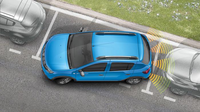 Dacia Sandero Pełne bezpieczeństwo w każdych warunkach System wspomagania parkowania tyłem*: ostrzega kierowcę sekwencją