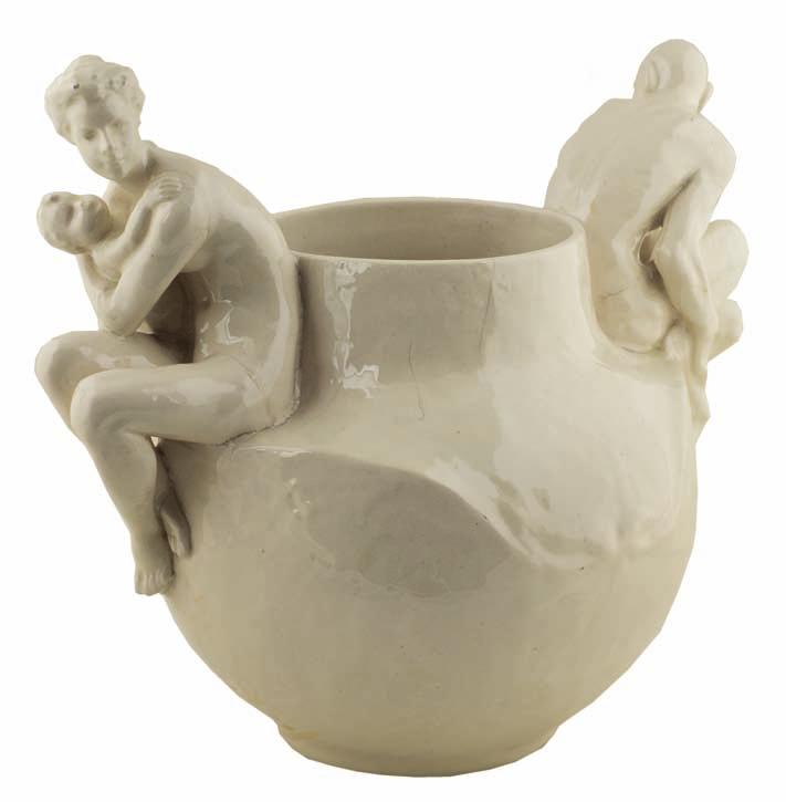 66. Konstanty laszczka (1865-1956) Wazon, dekorowany pełnoplastycznymi postaciami kobiety z dzieckiem i fauna, wys. 36 cm, XX w. Sygnowany dębniki (pęknięcie podstawy). 5.500,- rzeźbiarz i ceramik.
