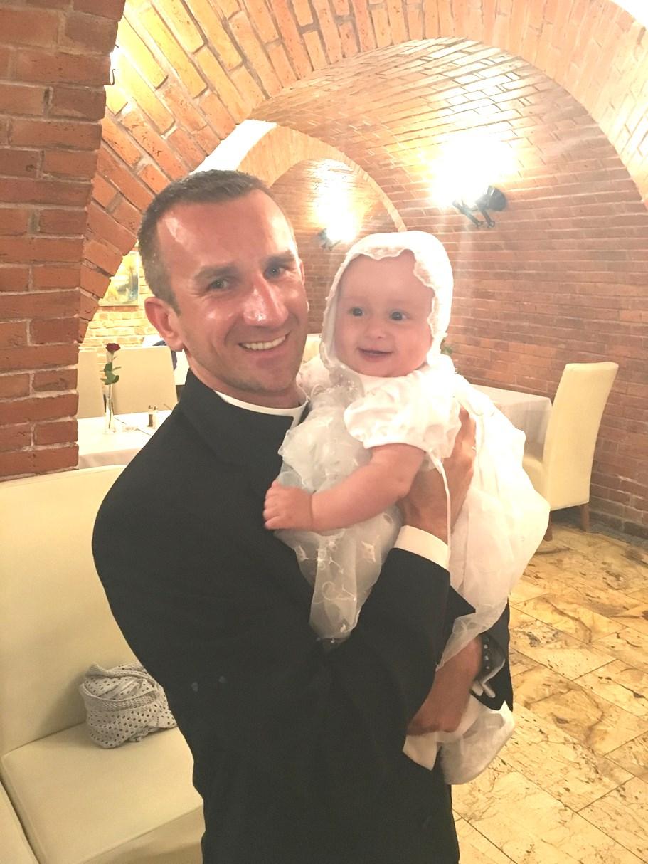 Fr. Chris trip to Poland to become a Godfather for his niece Lena. day 1 baby scared day 3 uncle scared day 5 best friends!