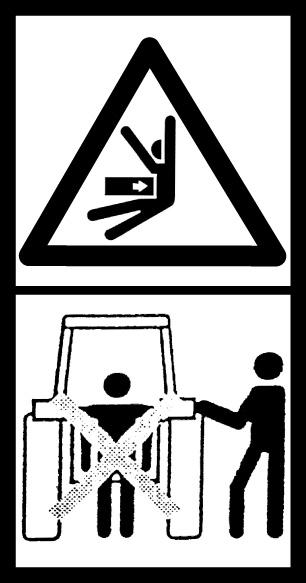 Znak informujący o zagrożeniu mechanicznym wciągnięcia całego ciała przez układ przeniesienia napędu (wał przegubowo-teleskopowy) oraz