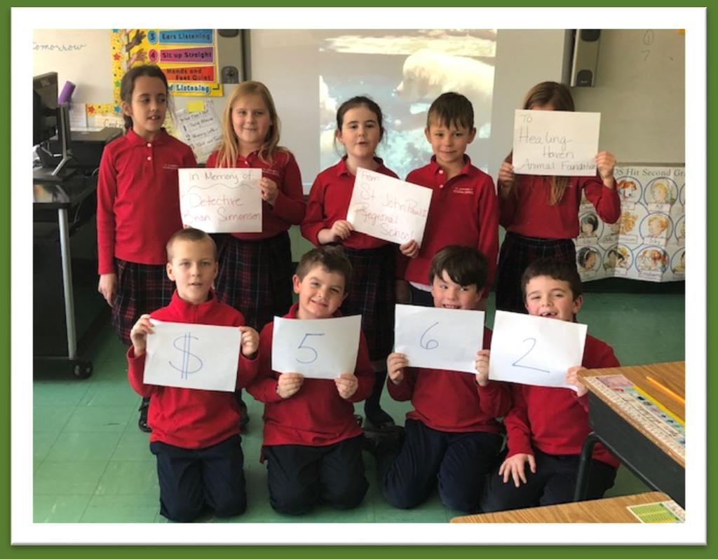 St. John Paul II Regional School second grade students hosted a school wide dress down day for Healing Haven Animal Foundation. They raised $562 to be donated in memory of Detective Brian Simonsen.