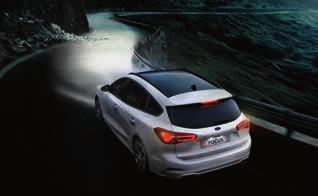 Aut High Beam - system autmatyczneg sterwania światłami drgwymi zawiera autmatyczne wycieraczki z czujnikiem deszczu Opcja dstępna tylk w pakiecie Technlgy (AGUAB) Glare-Free Aut High Beam - system