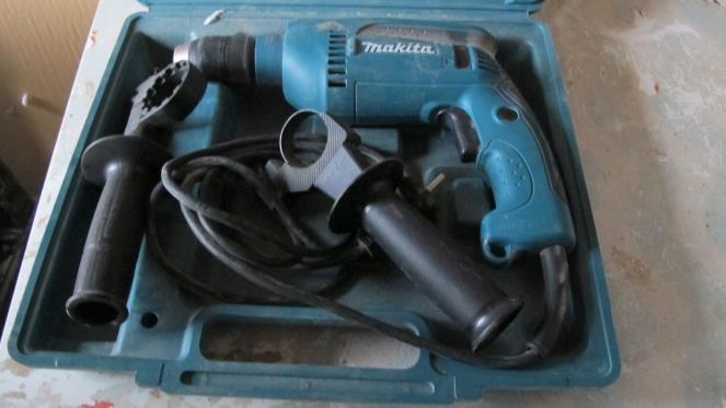 Stan techniczny dobry 12 Wkrętarka udarowa MAKITA HP1641 680 W 1 2015 Marka MAKITA Typ HP1641 Średnica