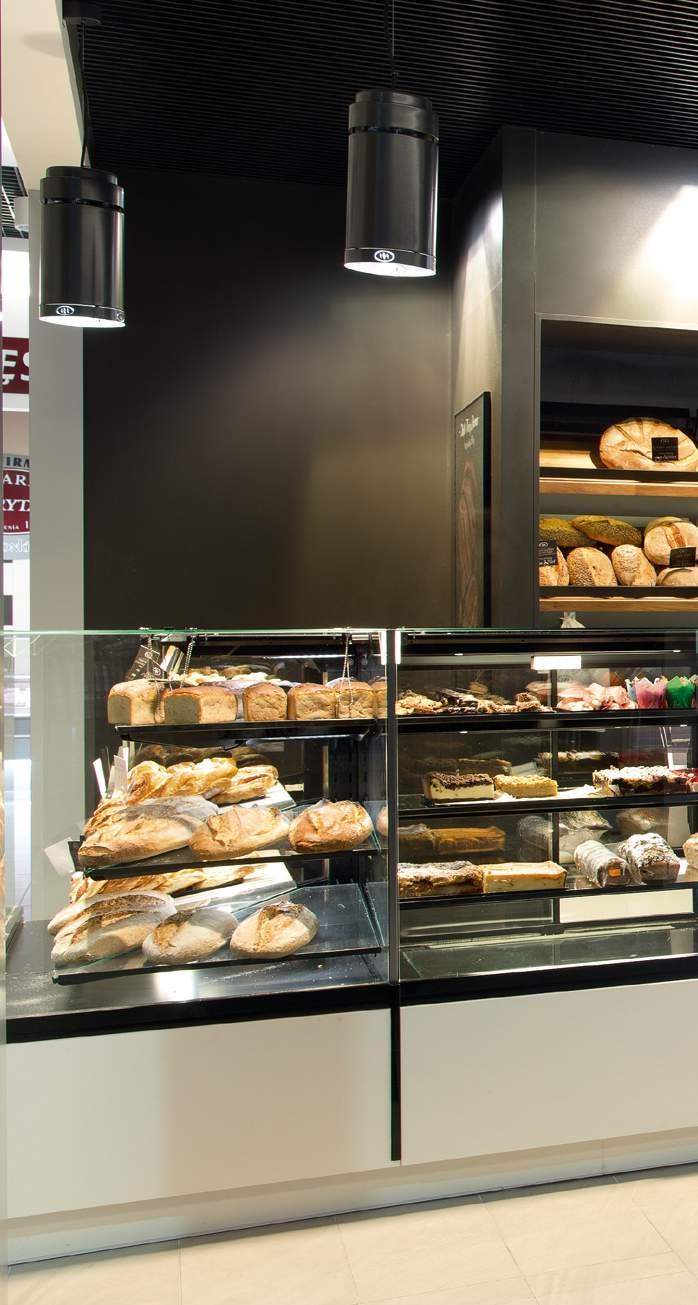 The cabinets with cooling, neutral and heating modules have been designed in the same style, resulting in a harmonious effect in the trade interiors.