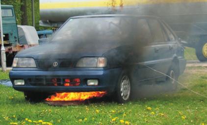 At car B, a fire was started near the engine, by lighting a tray with a fuel on a cushion pool,