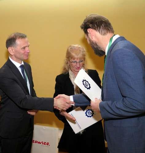Mańkiewicz-Cudny; Janusz Walo z gratulacjami dla Adama Augustynowicza i