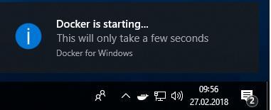Na pasku zadań Windows otworzy się automatycznie komunikat statusu Docker is starting. b.