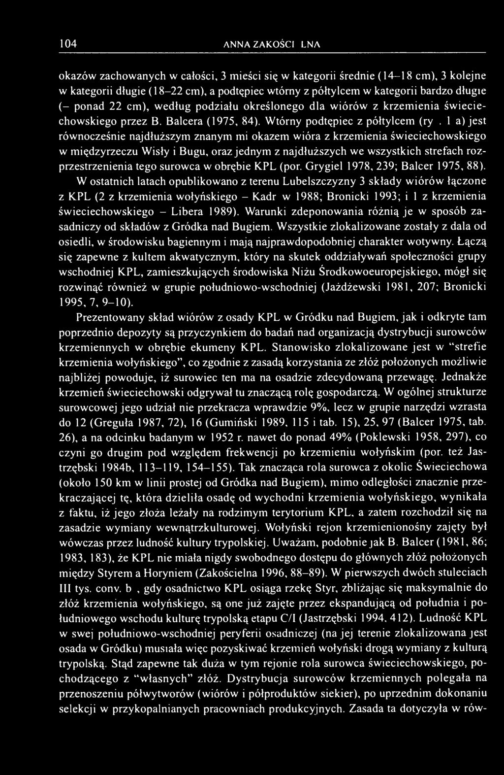 1 a) jest równocześnie najdłuższym znanym mi okazem wióra z krzemienia świeciechowskiego w międzyrzeczu Wisły i Bugu, oraz jednym z najdłuższych we wszystkich strefach rozprzestrzenienia tego surowca