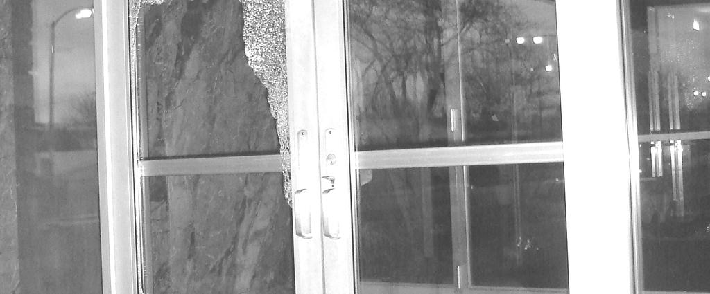 above. We see that the cement ashtray was lifted, broken, and used as the instrument of the vandalism.