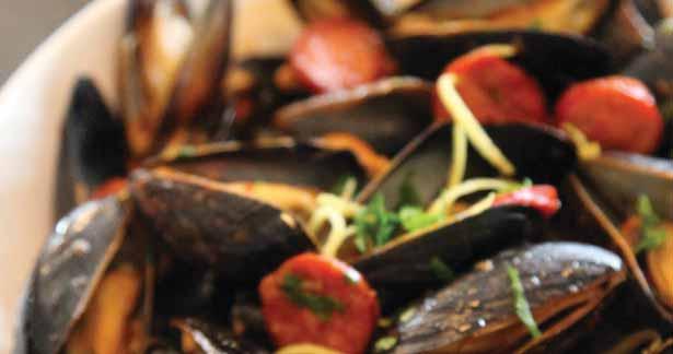 Preparation Time: 10 mins 5 lb fresh blue cultured mussels 2 tbsp olive oil 100 g dry-cured chorizo sausage, thinly sliced 2 clove garlic, minced 1 tsp Spanish smoked paprika 1 tbsp tomato paste