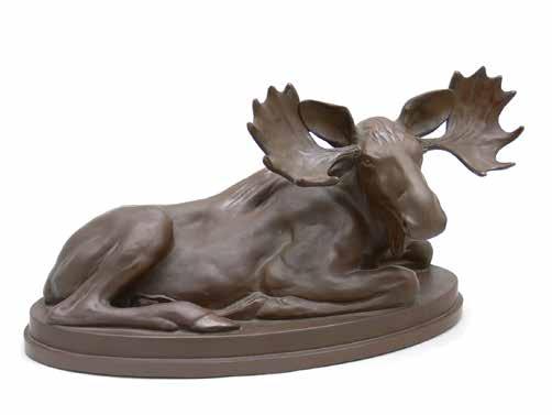 147 Figurka leżącej sarny w Kadynach, l. 1930 1944, proj. Arthur Steiner glina, miejscami szkliwiona; sygn. na zadzie A. Steiner ; na spodzie znak wytwórni; wys. 11 cm, dł.