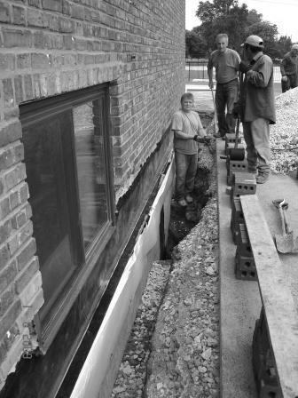 Because of the water that was seeping into the school through the cracks, the building s
