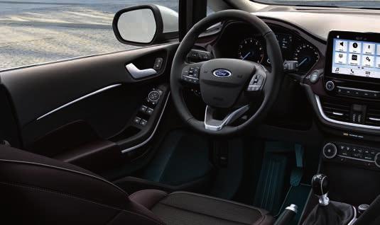 czujnikiem deszczu Wybrane elementy wyposażenia wnętrza Radioodtwarzacz z Ford SYNC 3 z 8" ekranem dotykowym Klimatyzacja automatyczna z elektroniczną regulacją temperatury (EATC) Tempomat Tapicerka