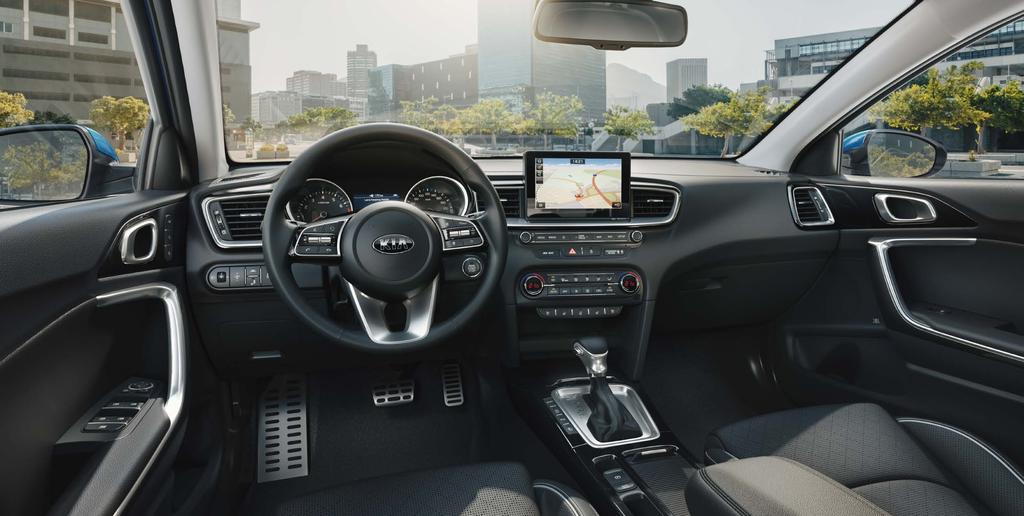 WNĘTRZE 13 Otoczenie idealne Nowa Kia Ceed została zaprojektowana z myślą o komforcie kierowcy. Harmonijna, elegancka deska rozdzielcza to podstawa przyjaznego, ergonomicznego wnętrza.