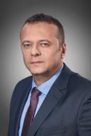 Jest absolwentem Akademii Górniczo-Hutniczej im. Stanisława Staszica w Krakowie Wydział Maszyn Górniczo-Hutniczych. Posiada uprawnienia do zasiadania w radach nadzorczych spółek Skarbu Państwa.
