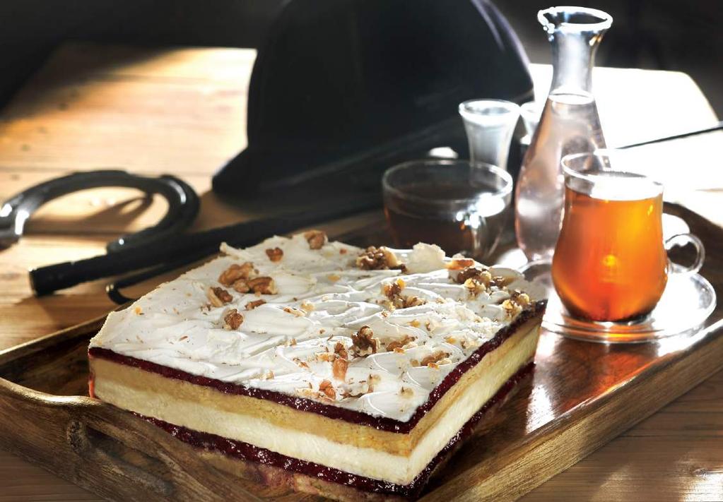 Do produkcji ciasta wykorzystano Do produkcji tortu wykorzystano Skoncentrowane Pasty Owocowe Prospona Nadzienie Frutamax Prospona Piernik z białym makiem Ciasto piernikowe: 8 jaj 466g Dżem czarna