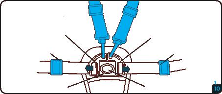 The stroller is equipped with a front wheel turning locking system. To activate it, set the front wheels to the forward direction, and then slide up the lock between the wheels.