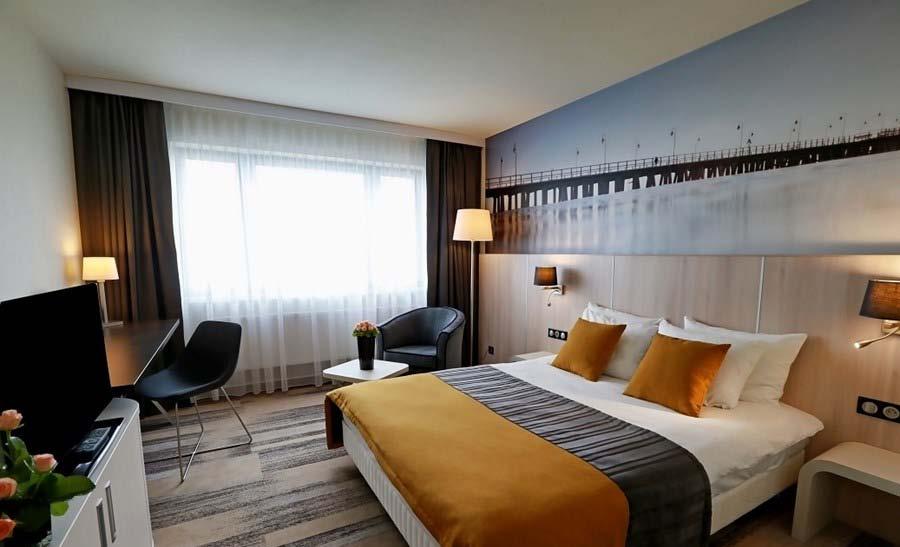 System RACS 5 w zastosowaniach hotelowych System RACS 5 umożliwia obsługę automatyki hotelowej w zakresie: Kontroli do