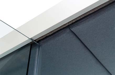 and hinges made of brushed steel installed in glass