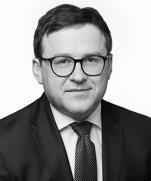 Autor publikacji z zakresu podatku od towarów i usług.