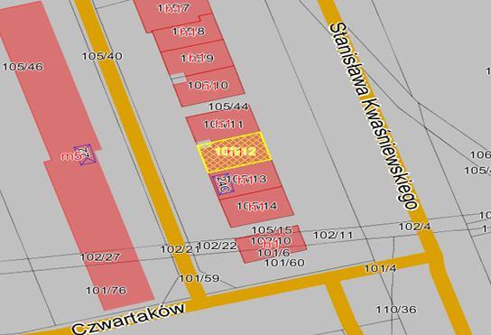stanowiącej chodnik w części frontowej pojedyncze nasadzenia ozdobne.
