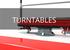 TURNTABLES Turntables have been created to further increase the efficiency of exchanging containers. These devices are installed next